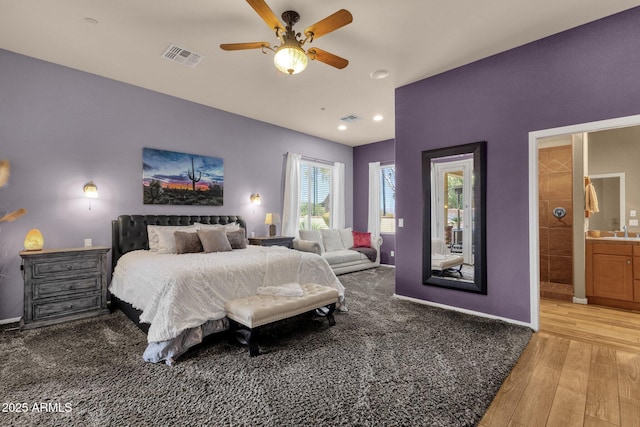 10254 N Demaret Dr, Fountain Hills, AZ 85268 - bedroom featuring hardwood / wood-style flooring, ceiling fan, ensuite bathroom, and sink