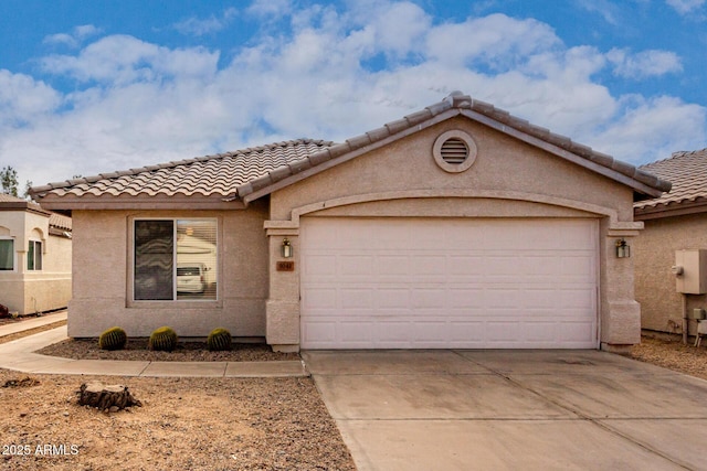 view of front of property with a garage