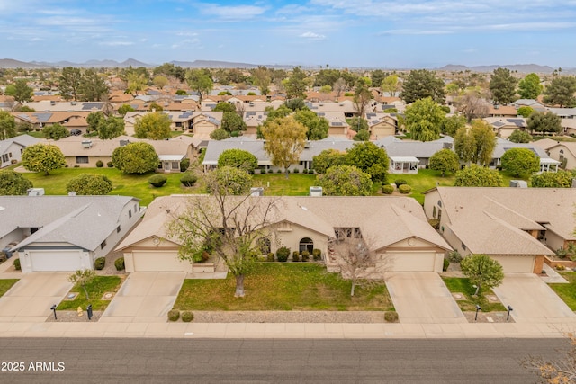 bird's eye view with a residential view and a mountain view