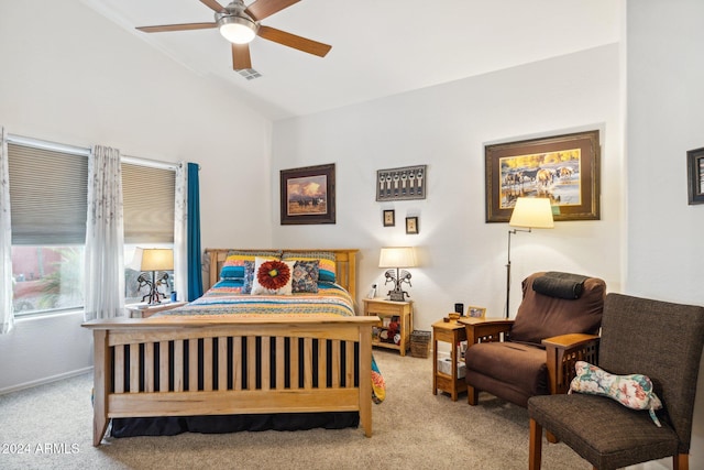 carpeted bedroom featuring ceiling fan and vaulted ceiling