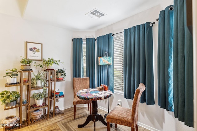 sitting room featuring hardwood / wood-style flooring