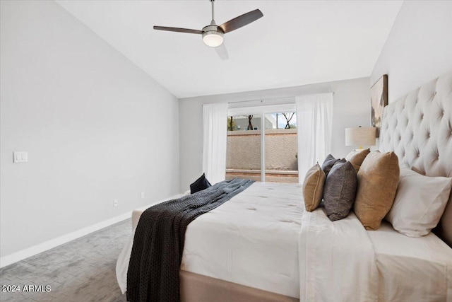 bedroom featuring carpet flooring, ceiling fan, and vaulted ceiling