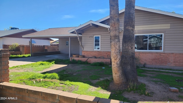 view of front of house with a carport