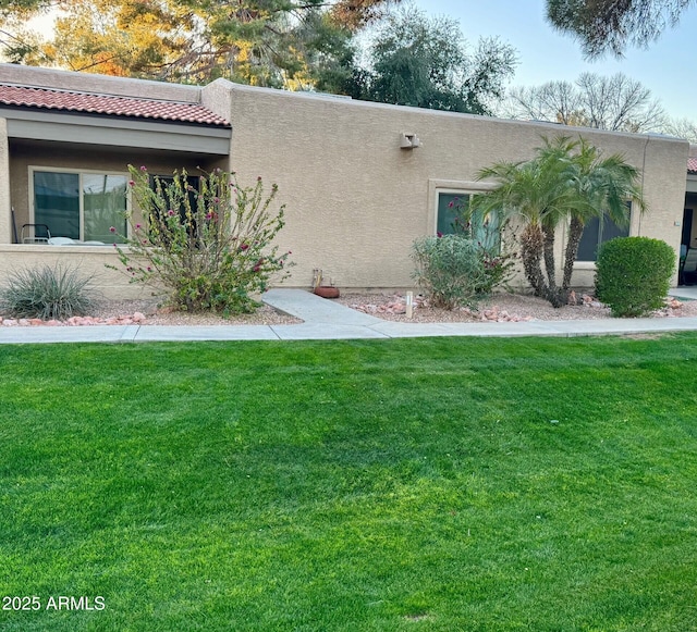 exterior space featuring a yard