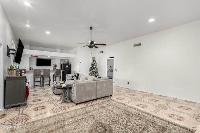 living room featuring ceiling fan