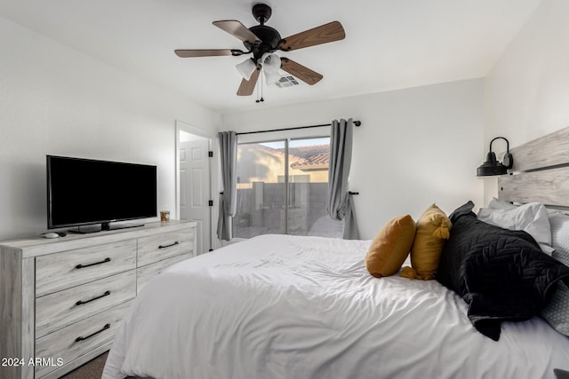 bedroom featuring access to outside and ceiling fan