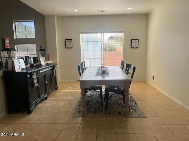 dining area featuring light tile patterned floors