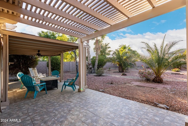 view of patio with a pergola and ceiling fan