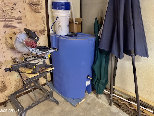 utility room with water heater