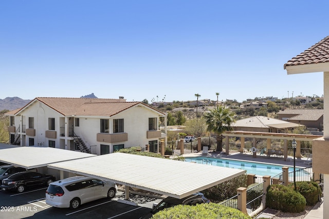 pool featuring central air condition unit and fence