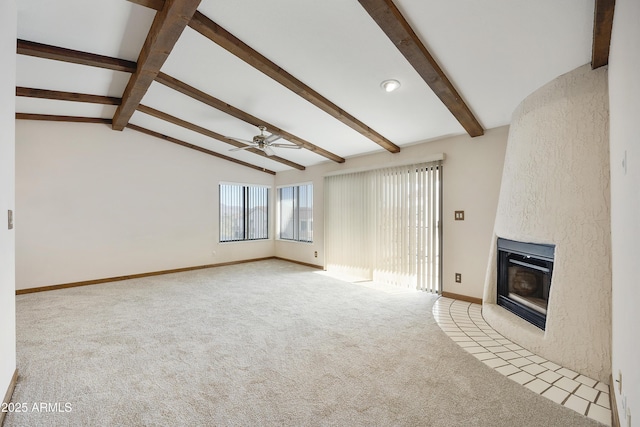 unfurnished living room featuring a fireplace, lofted ceiling with beams, a ceiling fan, light carpet, and baseboards