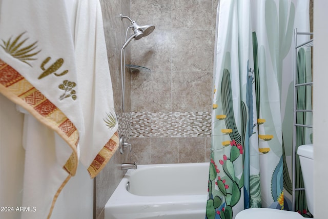 bathroom with shower / bathtub combination with curtain and toilet
