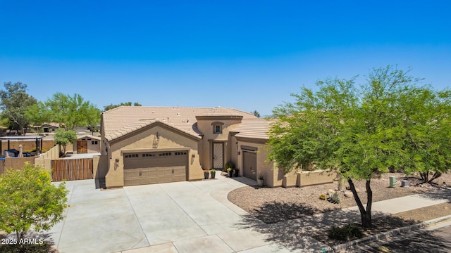 21284 E Camacho Rd, Queen Creek, AZ 85142 - view of front of house featuring a garage, concrete driveway, stucco siding, and a tile roof