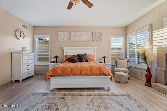 bedroom featuring ceiling fan and light wood-type flooring