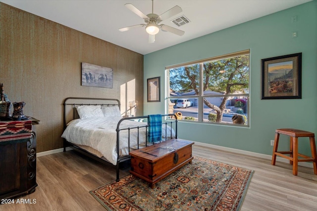 bedroom featuring light wood-type flooring and ceiling fan