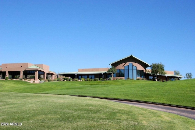 view of home's community with a lawn