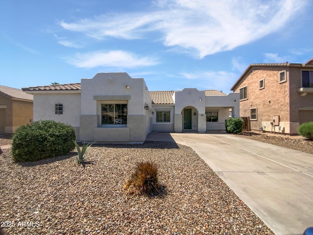19973 E Thornton Rd, Queen Creek, AZ 85142 - view of front of home featuring a tile roof, stucco siding, and driveway