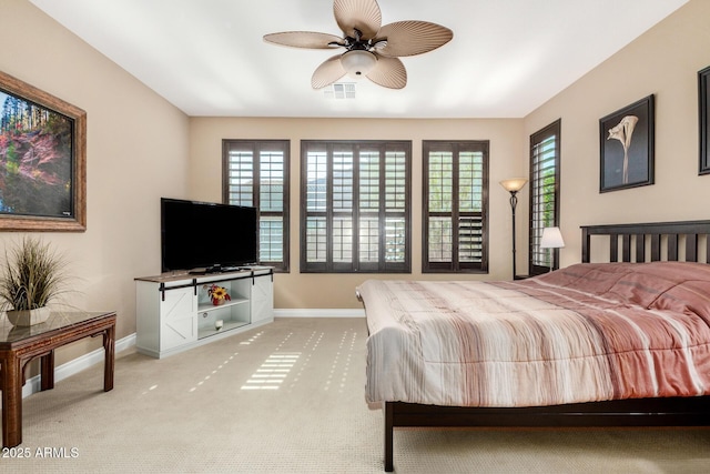 815 E Laddoos Ave, San Tan Valley, AZ 85140 - bedroom with a ceiling fan, visible vents, light carpet, and baseboards