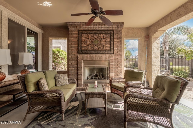 815 E Laddoos Ave, San Tan Valley, AZ 85140 - exterior space with an outdoor living space with a fireplace, fence, and a ceiling fan