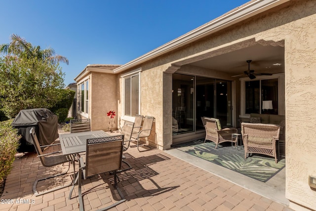 815 E Laddoos Ave, San Tan Valley, AZ 85140 - view of patio / terrace with a grill, a ceiling fan, and outdoor dining space