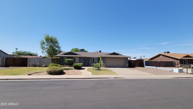 5539 E Dragoon Ave, Mesa, AZ 85206 - ranch-style home featuring concrete driveway and an attached garage