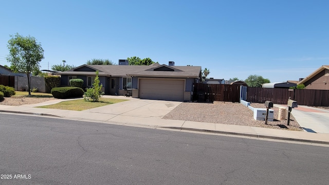 5539 E Dragoon Ave, Mesa, AZ 85206 - ranch-style home featuring concrete driveway, a garage, brick siding, and a gate