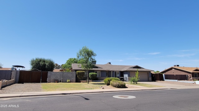 5539 E Dragoon Ave, Mesa, AZ 85206 - ranch-style house with an attached garage, driveway, and a gate