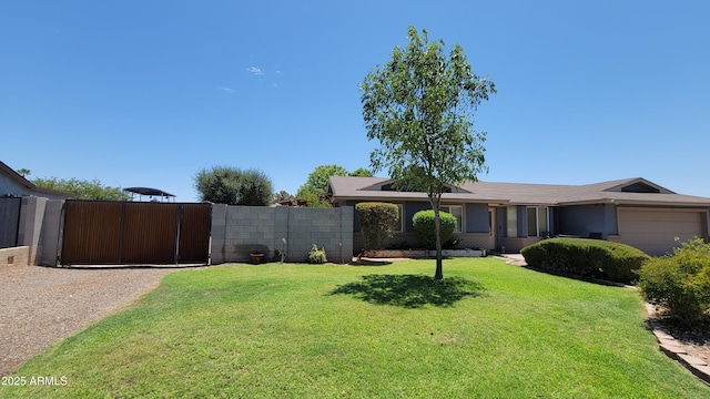 5539 E Dragoon Ave, Mesa, AZ 85206 - view of yard with a gate and a garage