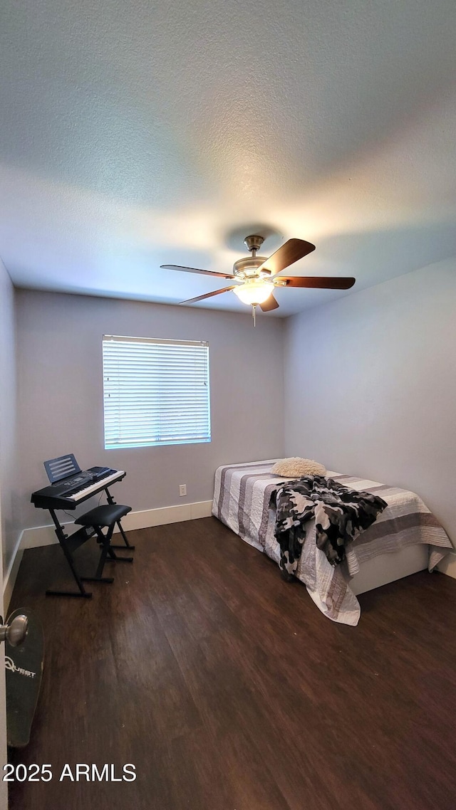 5539 E Dragoon Ave, Mesa, AZ 85206 - bedroom featuring dark wood finished floors and a ceiling fan