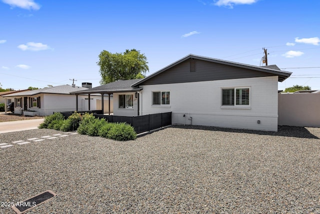 7707 E Earll Dr, Scottsdale, AZ 85251 - back of property featuring brick siding