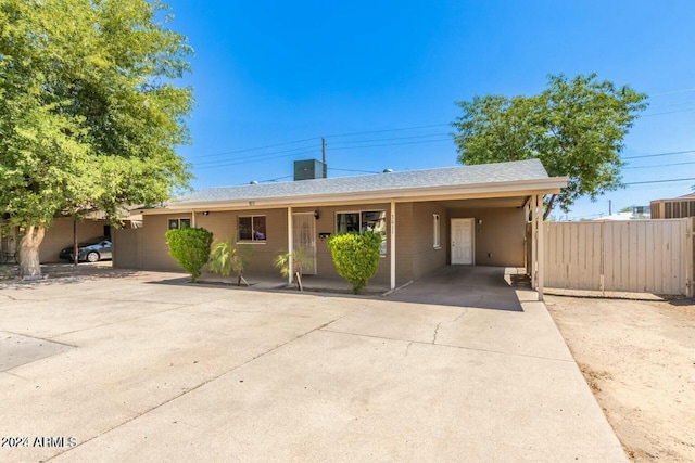 single story home with a carport