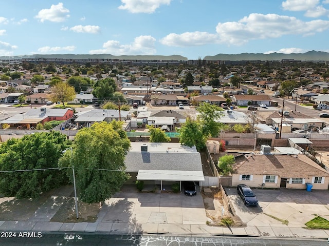 drone / aerial view featuring a mountain view