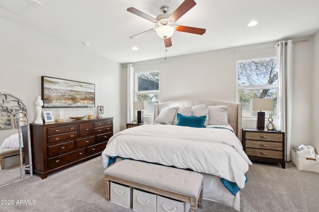 carpeted bedroom with ceiling fan