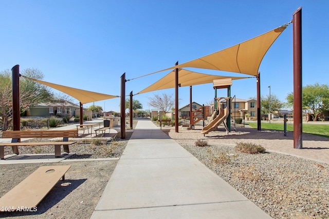 view of home's community featuring a playground