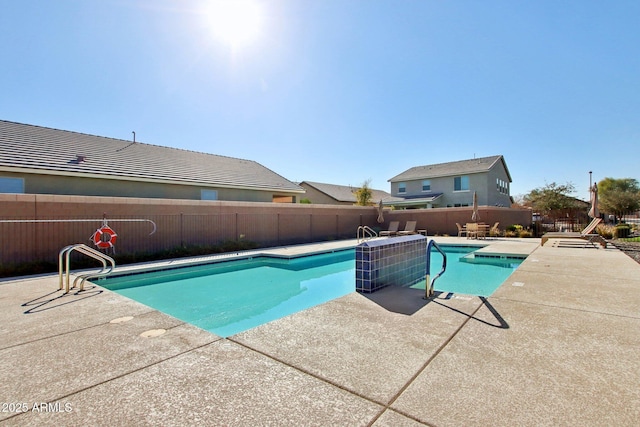 view of pool with a patio