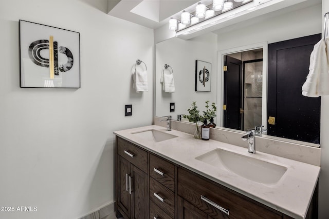 full bath with double vanity and a sink