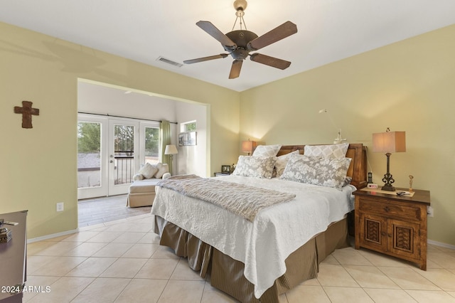 bedroom with light tile patterned flooring, ceiling fan, and access to outside