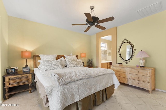 tiled bedroom with ceiling fan