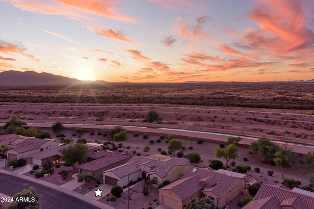 aerial view at dusk with a mountain view