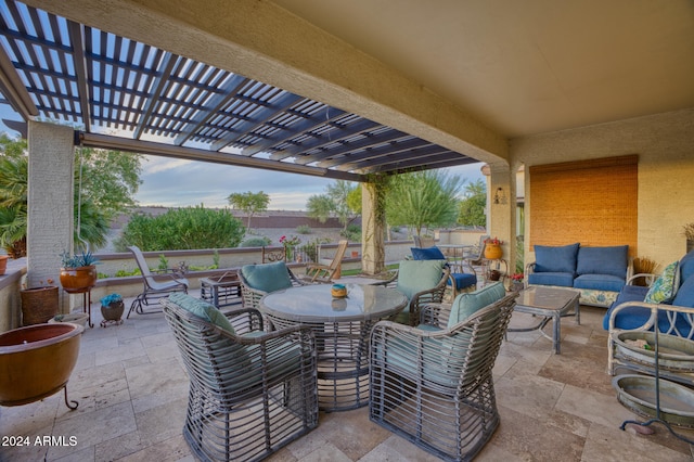 view of patio / terrace with a pergola and an outdoor hangout area