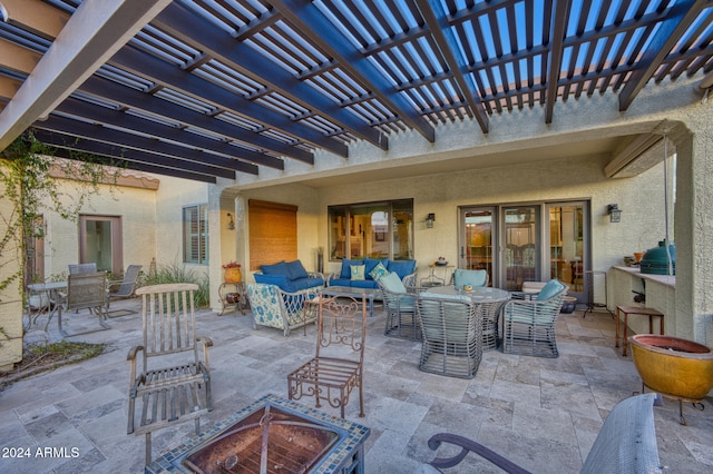 view of patio / terrace featuring a pergola and an outdoor hangout area