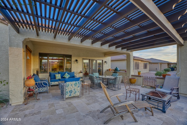 view of patio / terrace with an outdoor living space and a pergola