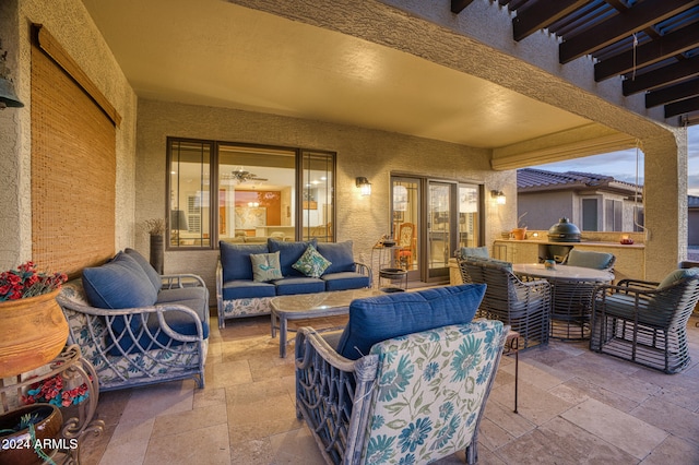 view of patio featuring an outdoor hangout area and exterior kitchen