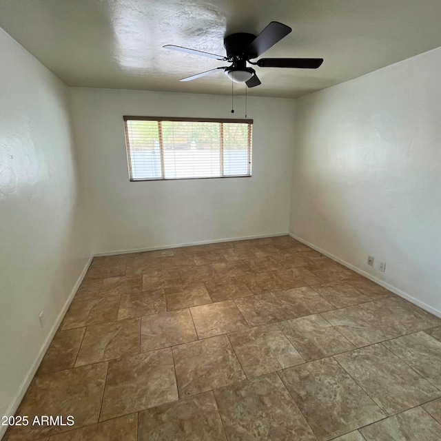 4118 N 3rd Ave, Phoenix, AZ 85013 - spare room with ceiling fan and baseboards