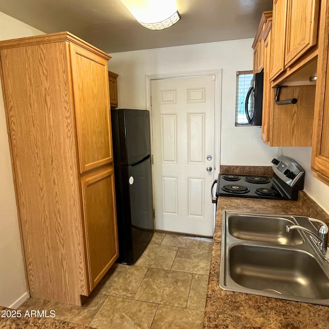 4118 N 3rd Ave, Phoenix, AZ 85013 - kitchen with black appliances, a sink, and dark countertops