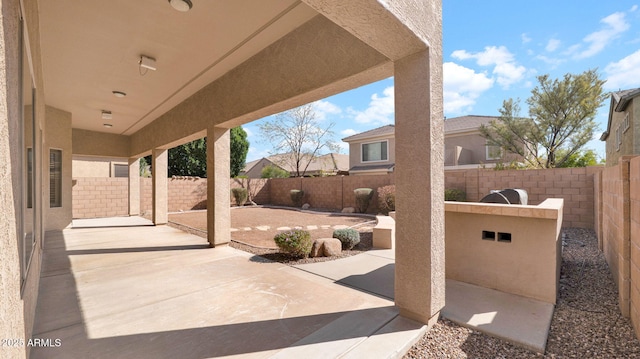view of patio with a fenced backyard