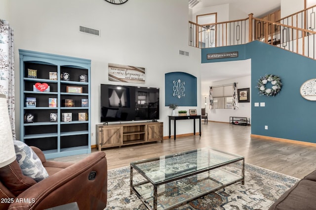 16210 W Durango St, Goodyear, AZ 85338 - living room with wood finished floors and a high ceiling