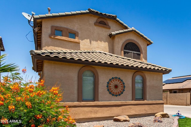 16210 W Durango St, Goodyear, AZ 85338 - view of front facade featuring a tile roof and stucco siding