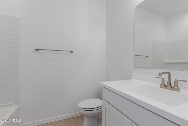 bathroom featuring tile patterned flooring, vanity, and toilet