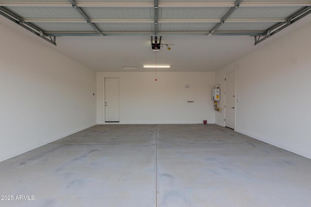 garage with water heater and a garage door opener